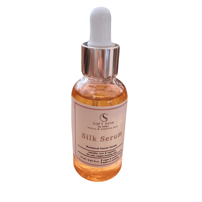 Soft Skin Silk Serum bottle on white background