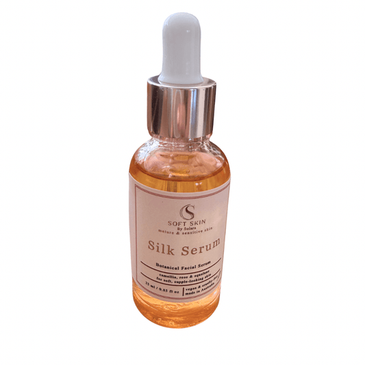 Soft Skin Silk Serum bottle on white background
